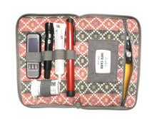 Load image into Gallery viewer, The beautiful red and black patterned fabric lining with the extra pop of yellow pocket linings in this otherwise understated grey kit case in medium size. #ethicallymade

