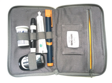 Load image into Gallery viewer, Internal view of the red and black outer kit case showing the necessary equipment to test your blood sugar levels and organise your diabetes management.
